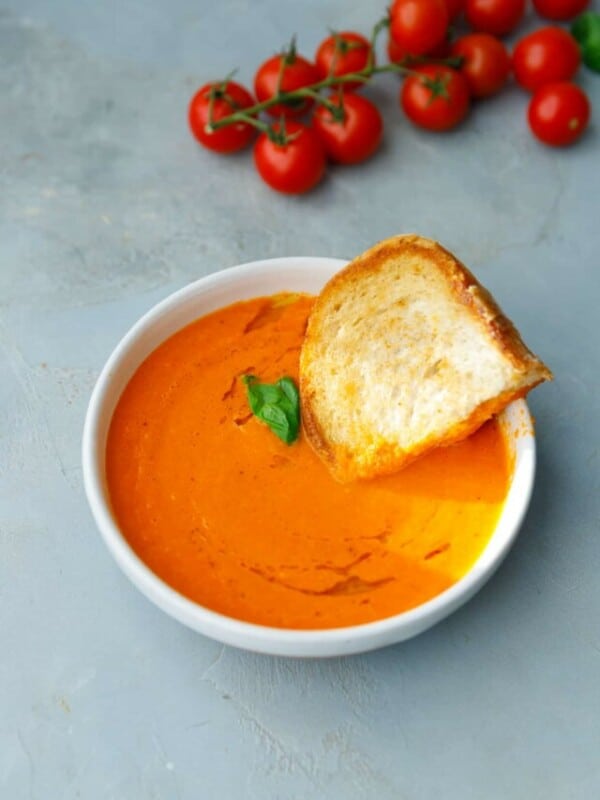A bowl with roasted cherry tomato soup