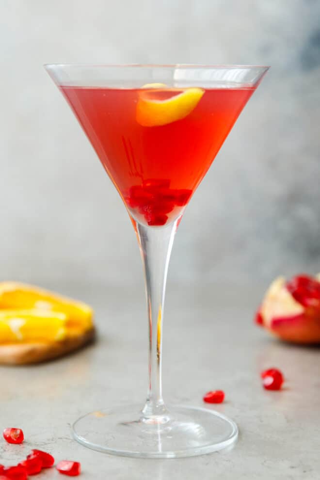 A martini glass with pomegranate martini