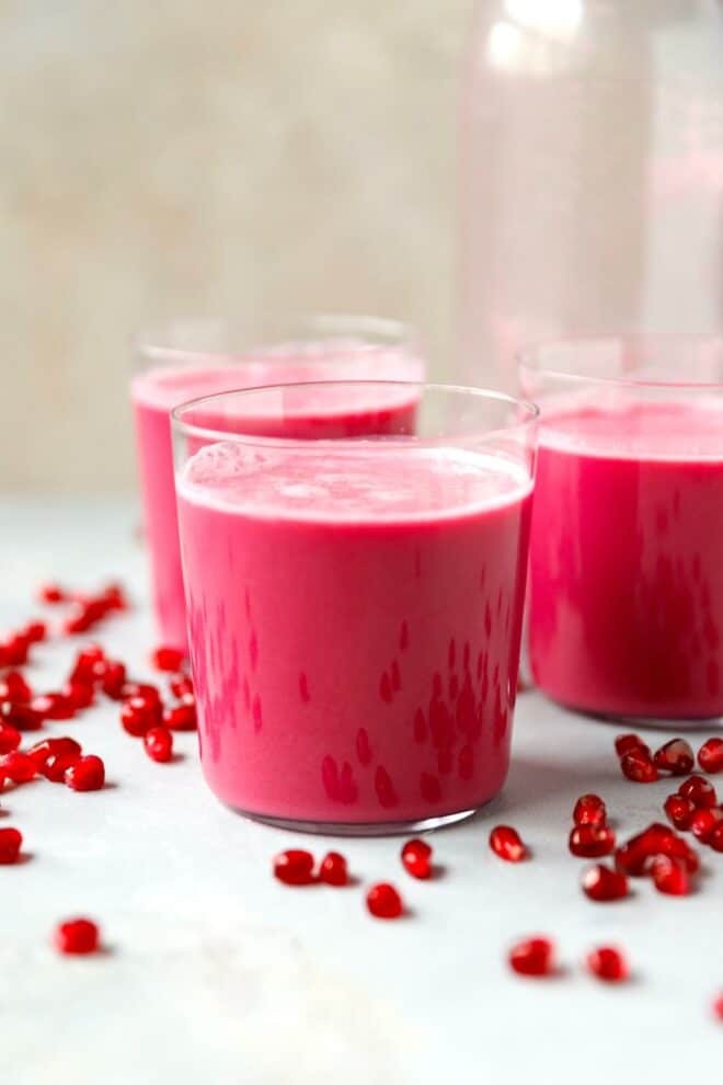 Glasses with homemade freshly squeezed pomegranate juice.