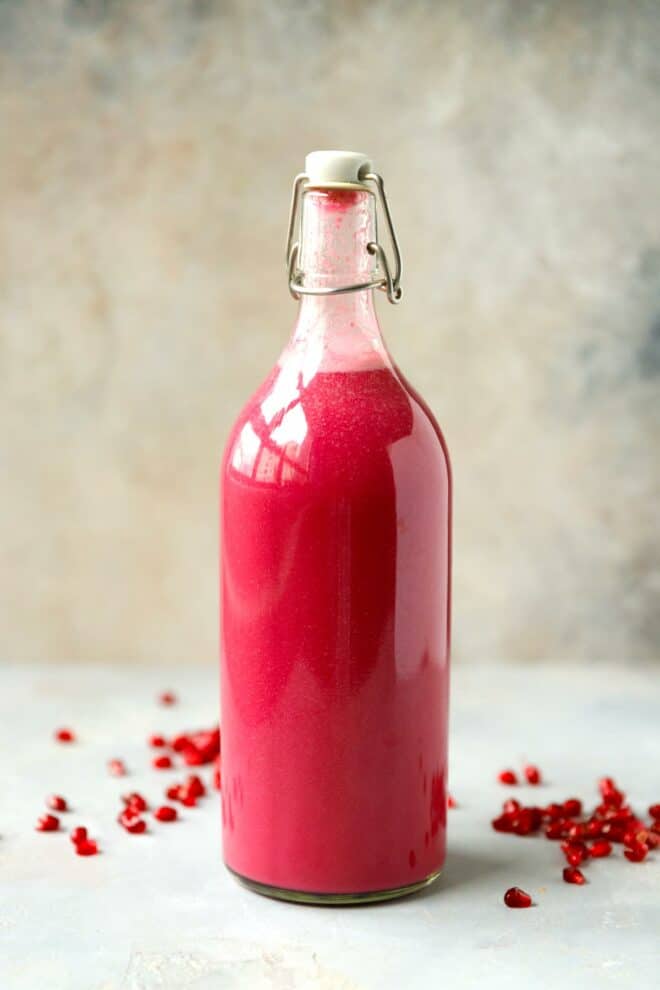 A bottle with homemade pomegranate juice