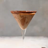 A martini glass with Baileys Irish Cream Chocolate Martini