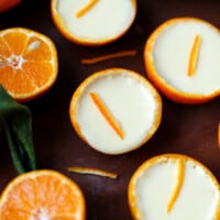 Tangerine shells filled with luscious tangerine posset