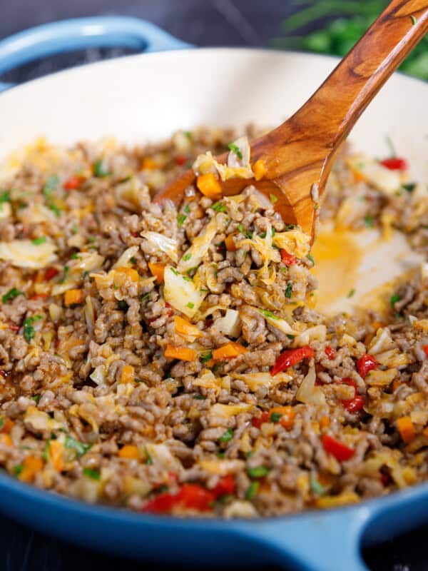 A braiser with hearty cabbage, ground beef and vegetables dish