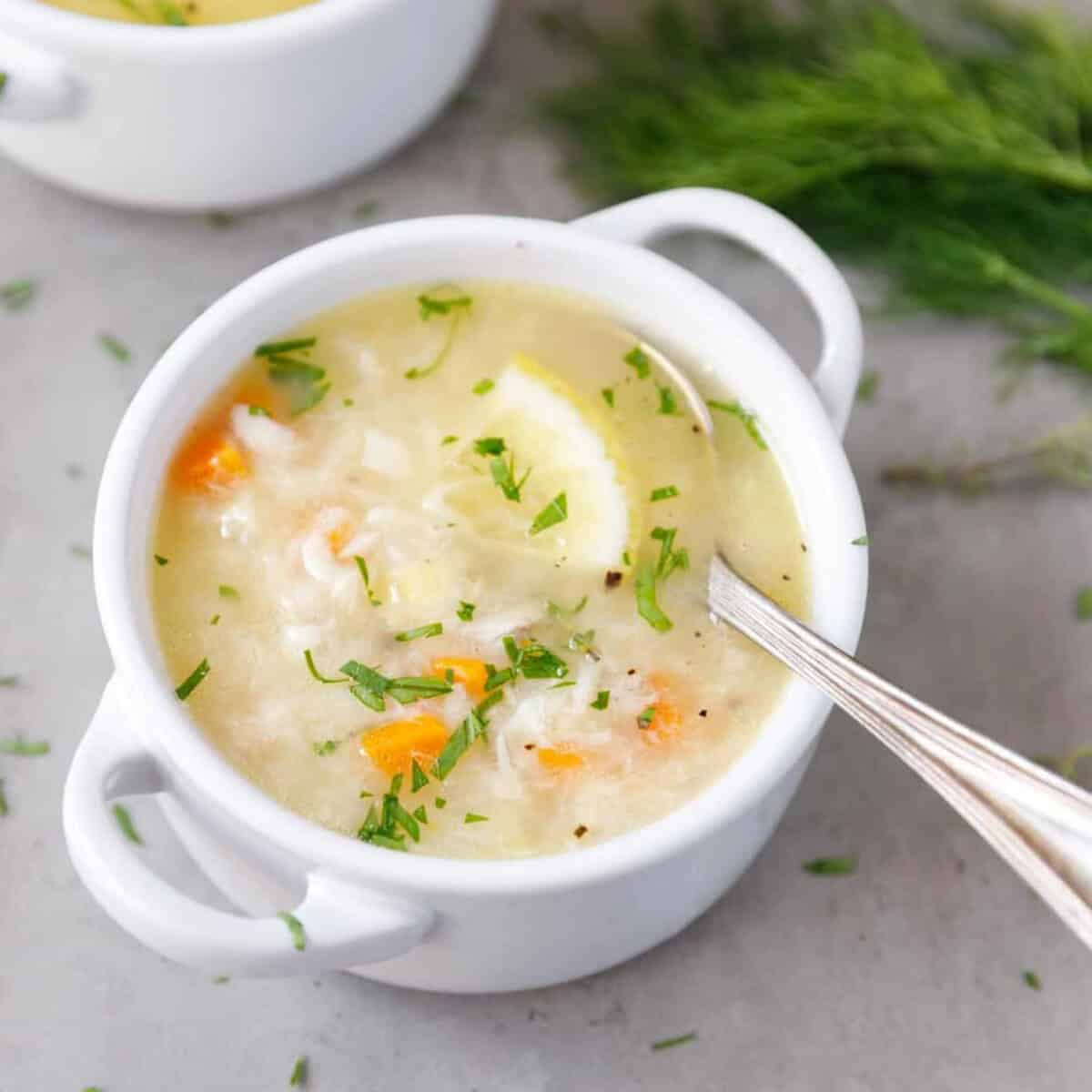 A small white bowl with Greek fish soup
