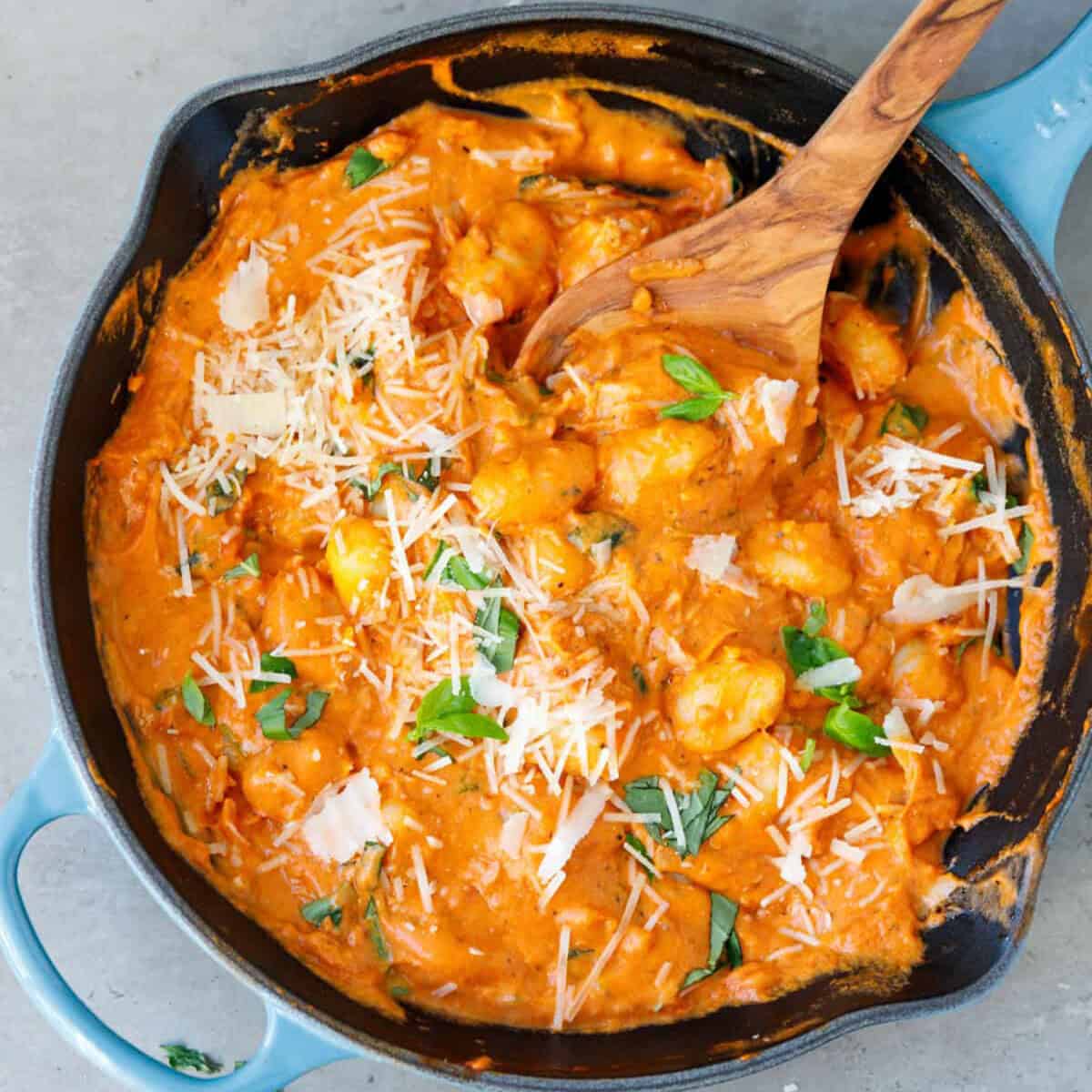 A cast ion skillet with creamy tomato gnocchi