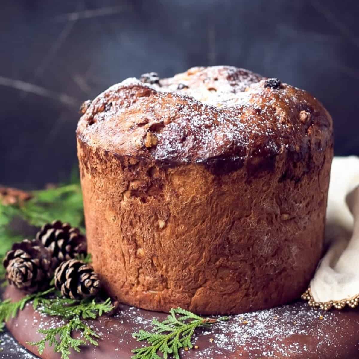 A homemade Panettone on a wooden cutting board