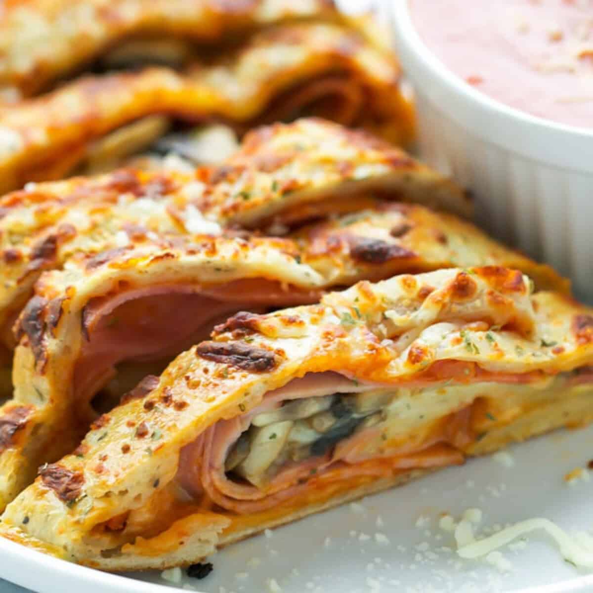 Sliced stromboli on a plate