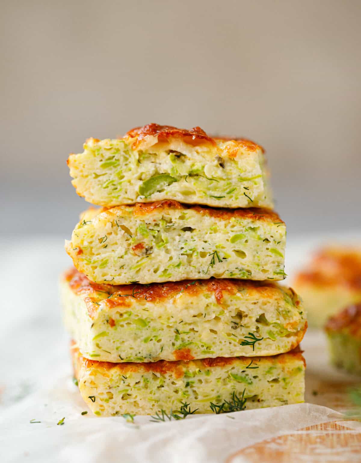 Stack of cheesy zucchini protein squares