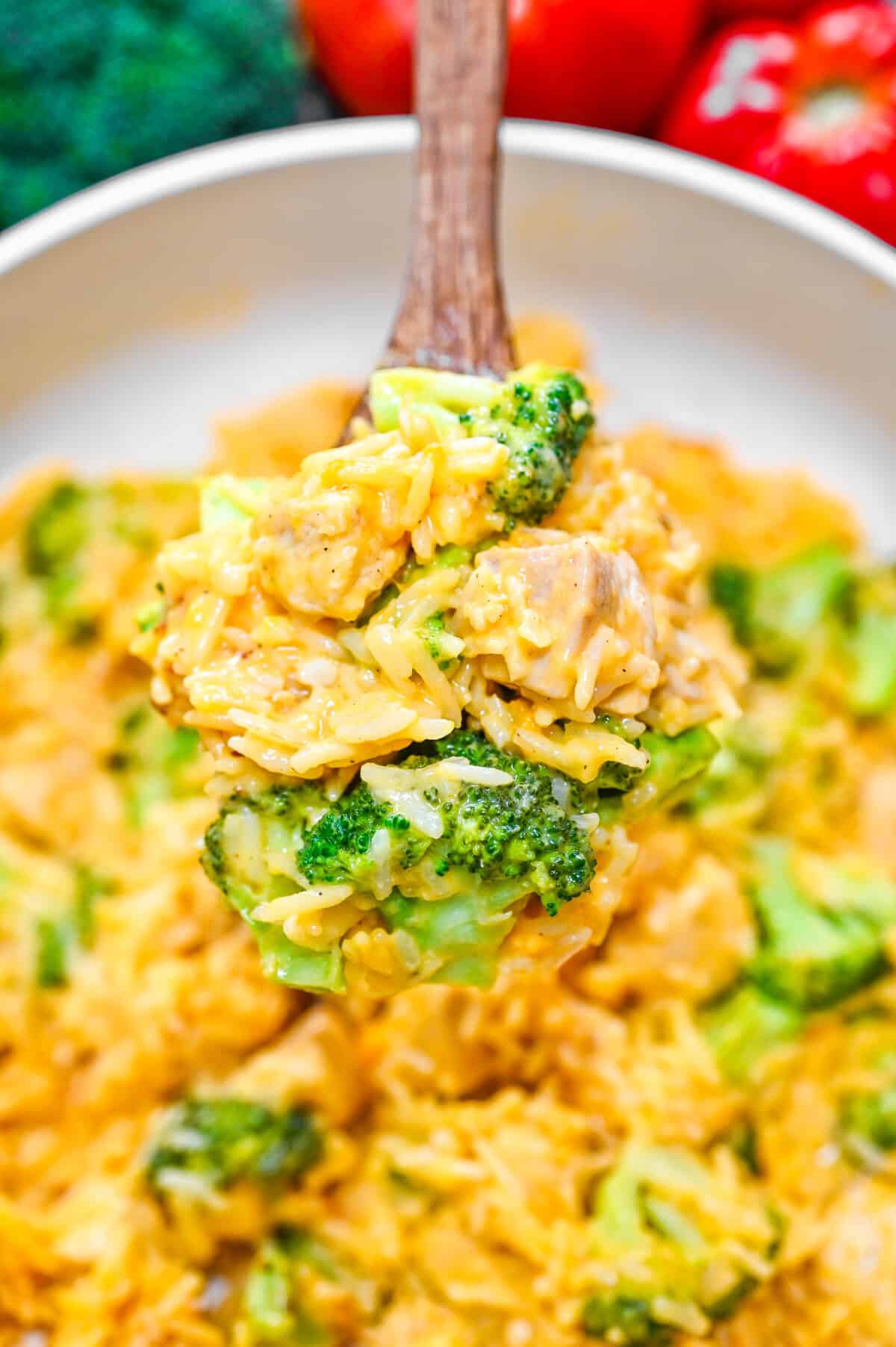 Creamy rice and broccoli chicken casserole with fresh parsley garnish