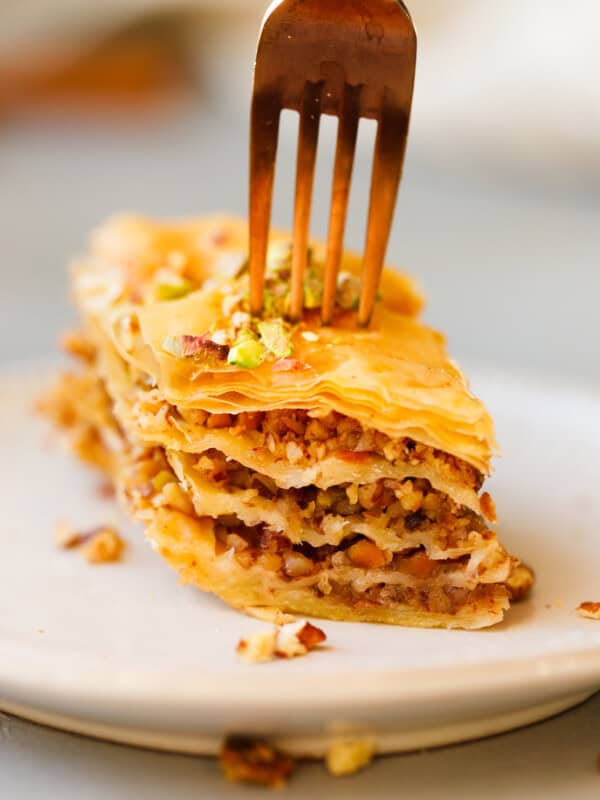 Baklava recipe with extra-thin filo layers, mixed nut filling, and crisp syrup-soaked pastry