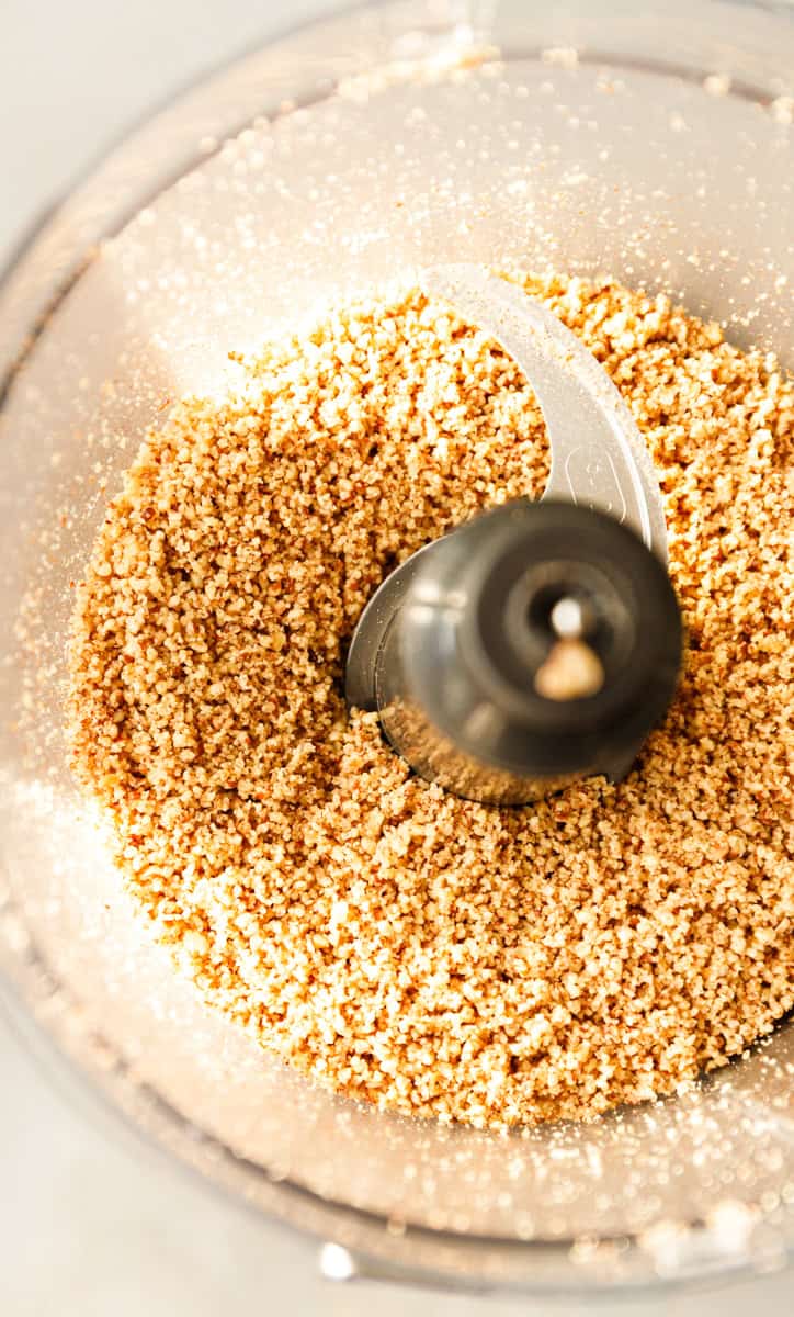 Ground pecans pulsed to a coarse sand texture for maple pecan cookies