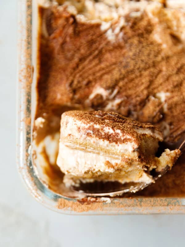 Skyr tiramisu slice with espresso-soaked ladyfingers and cocoa powder