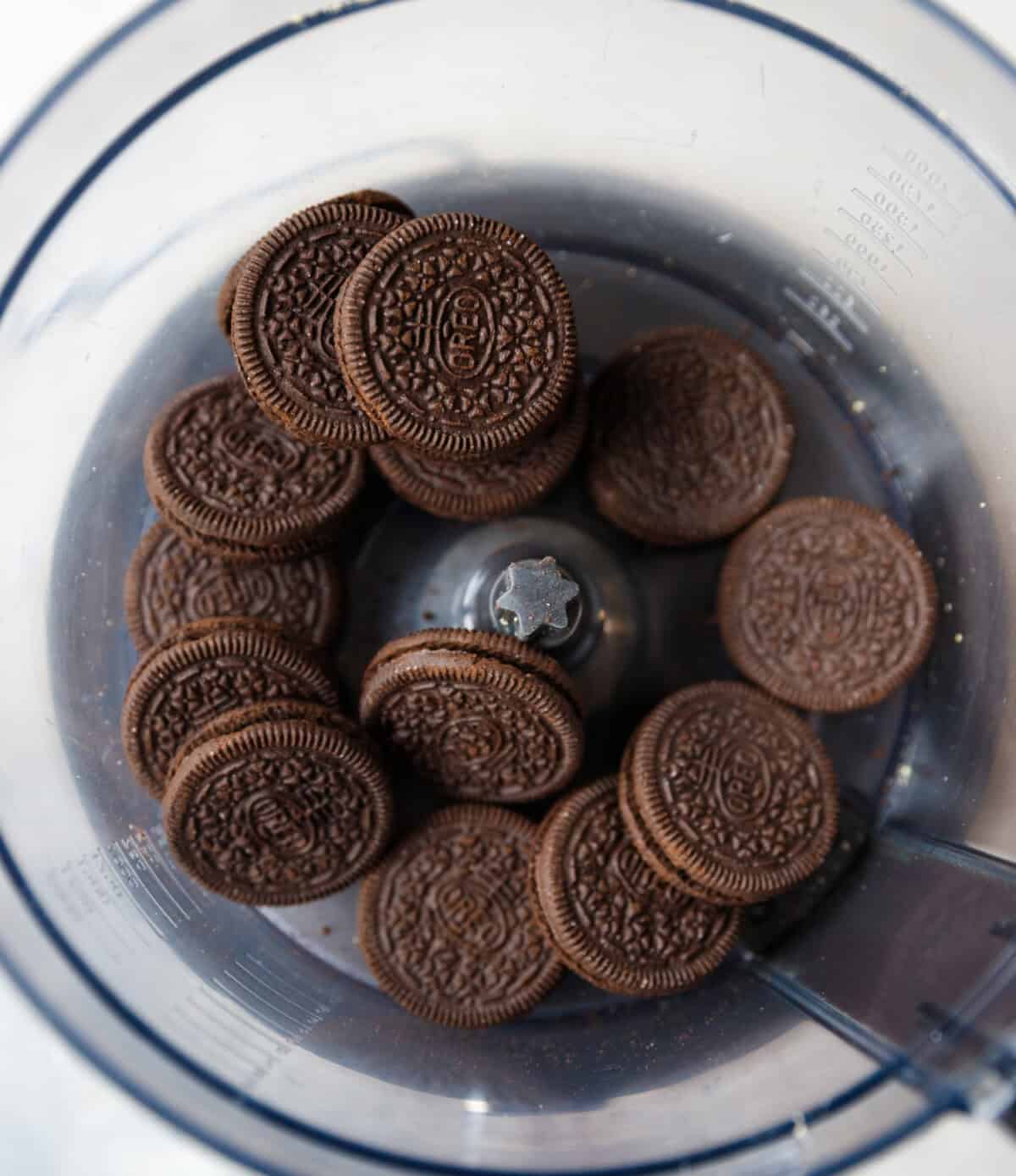 Oreo cookies in a food processor before crushing