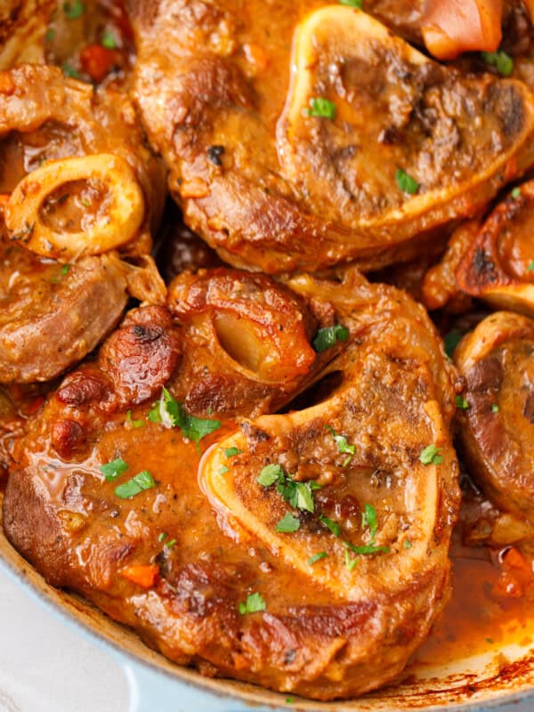 Close-up of tender beef shank Osso buco with marrow bones and rich sauce