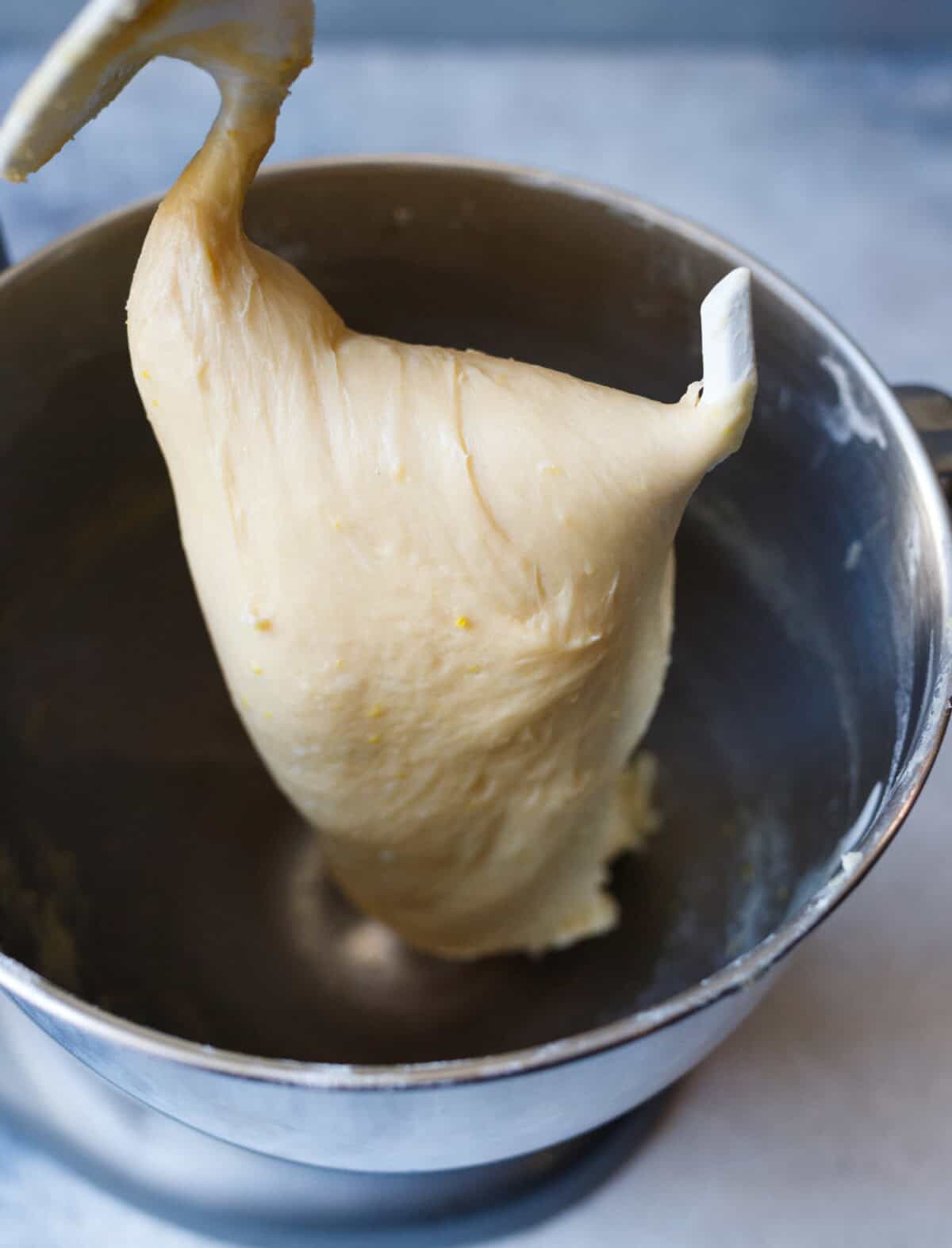 smooth elastic kulich dough after kneading showing stretch and structure