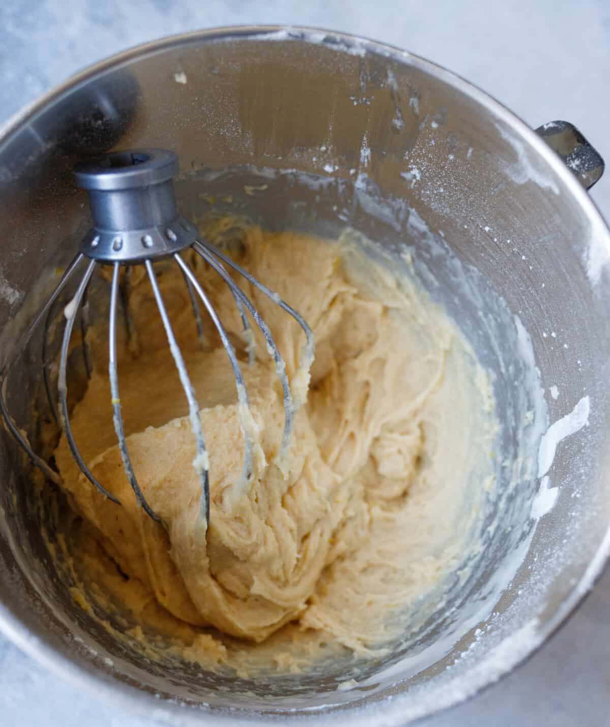 soft sticky kulich dough mixing in stand mixer with dough hook