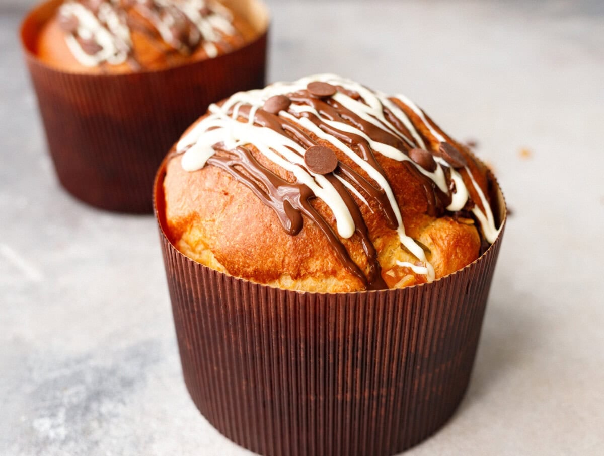 whole kulich russian easter bread tall and golden in baking mold