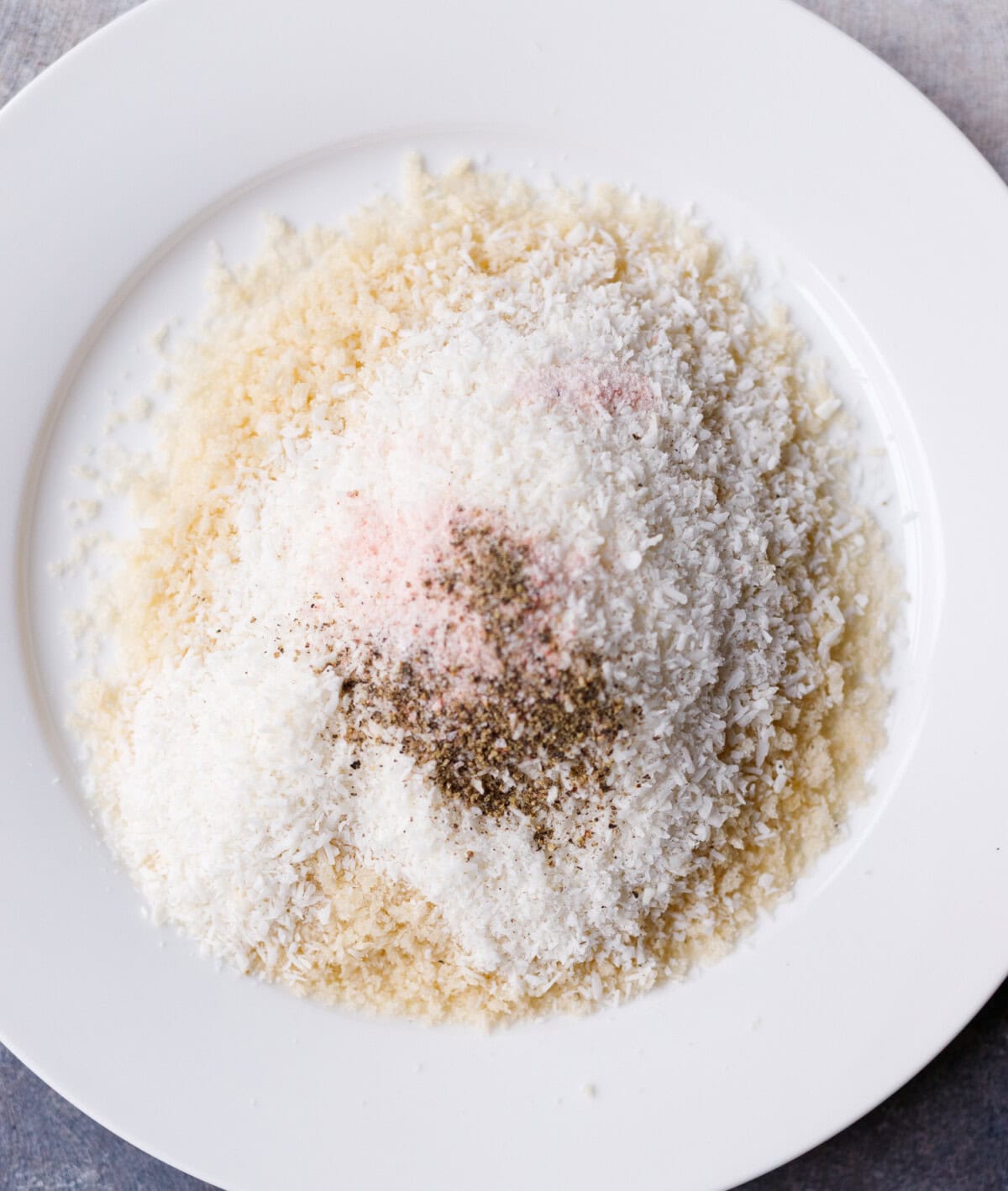 Panko breadcrumbs mixed with shredded coconut, salt and pepper