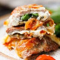 Three ground turkey pockets stacked and cut open showing cream