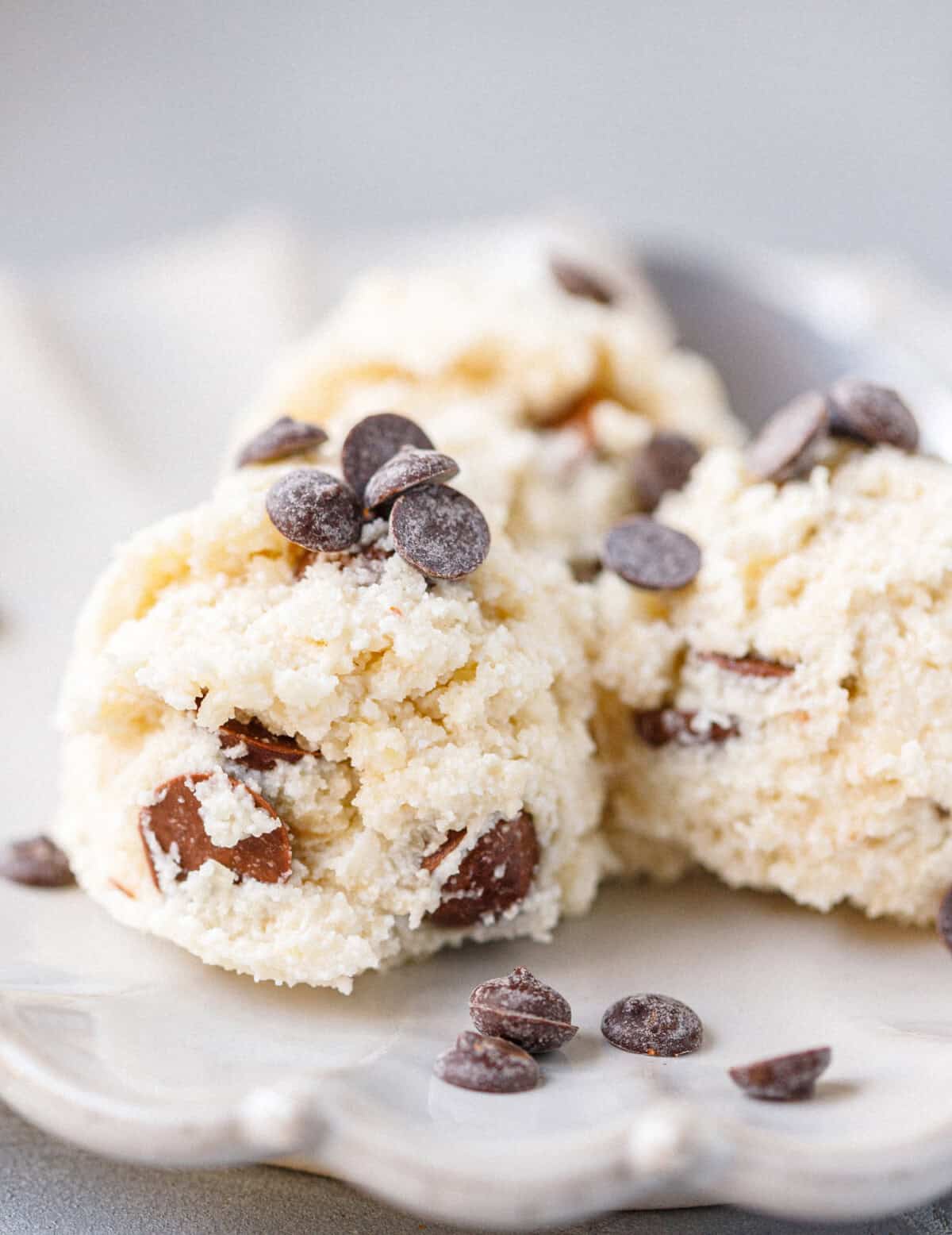 Close-up of protein cookie dough scoops studded with chocolate chips