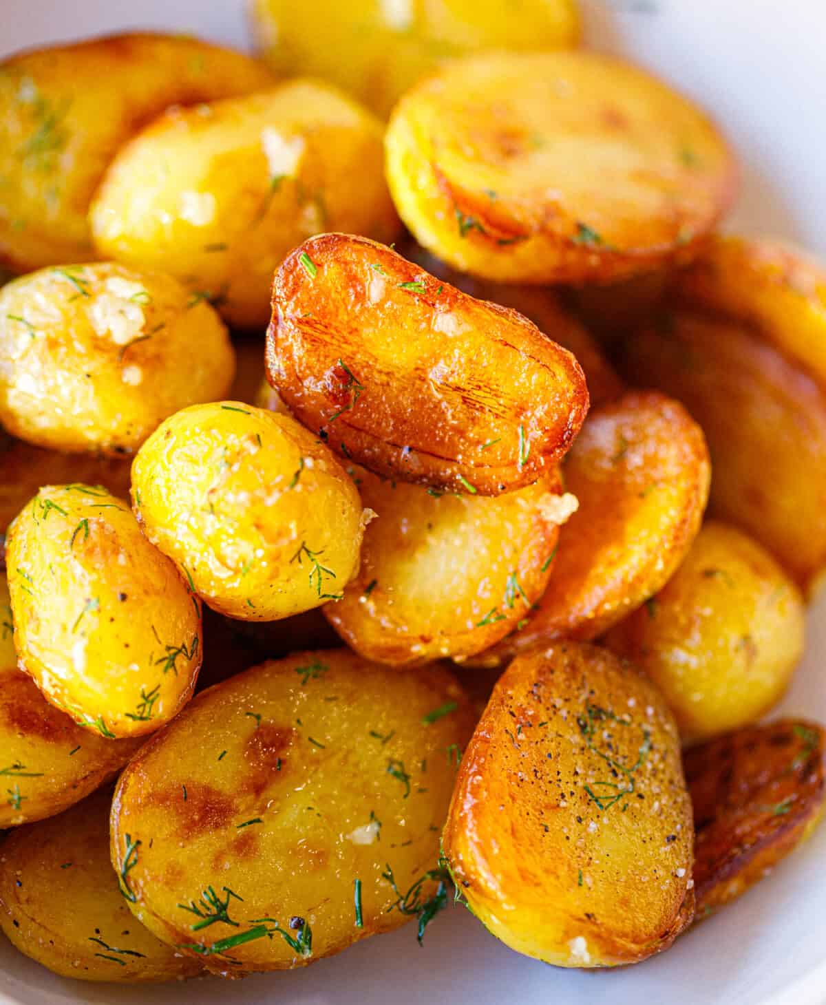 Bowl of Bulgarian sautéed potatoes with dill, crispy and golden