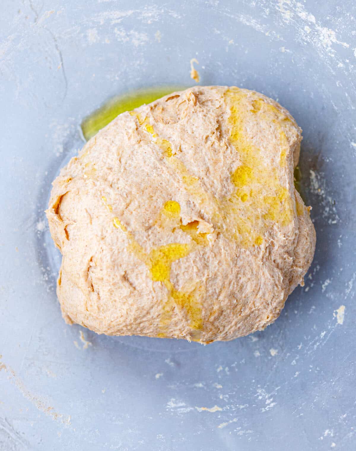 Spelt bread recipe dough coated in olive oil before the first rise