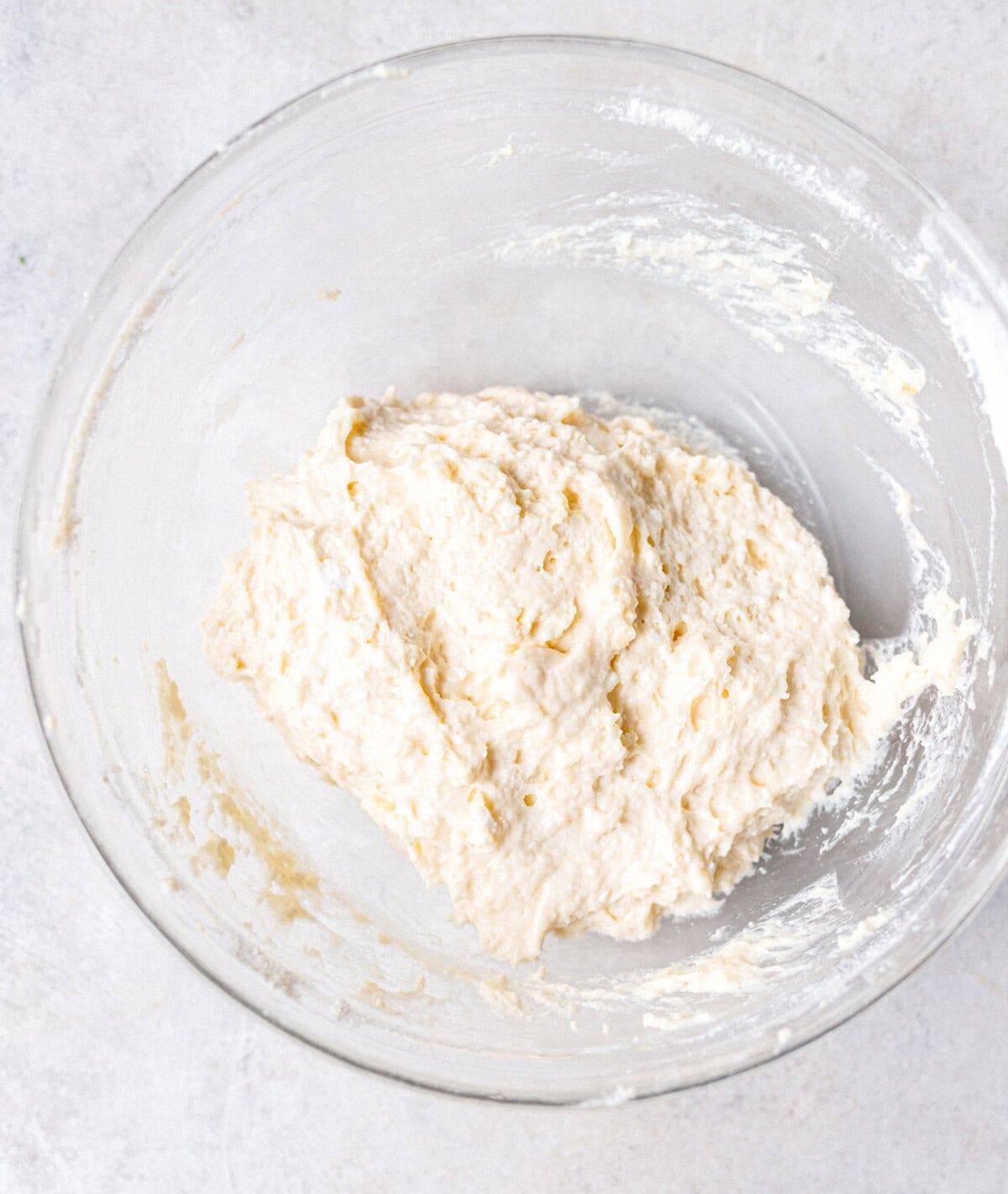 Cottage cheese scone dough in a glass bowl before the chocolate chips are added