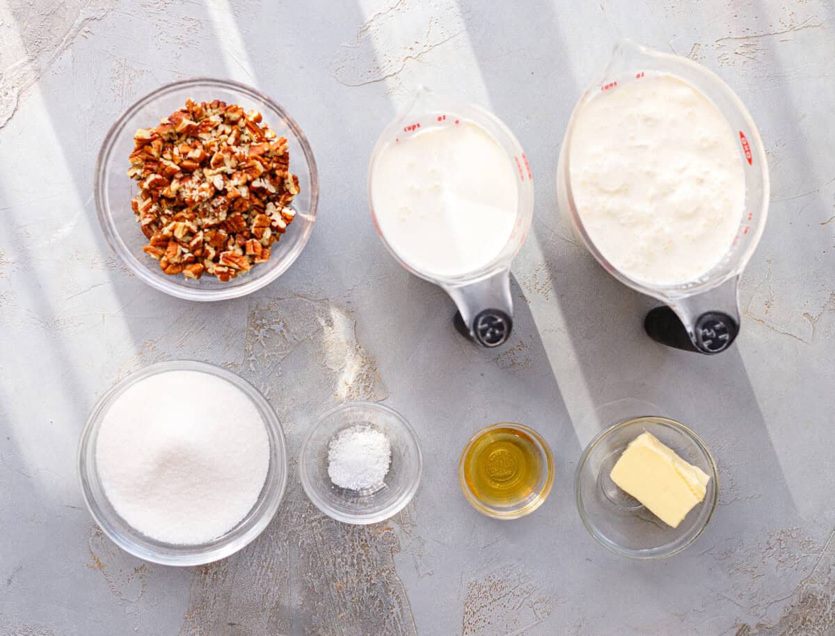 Ingredients needed to make butter pecan ice cream at home.
