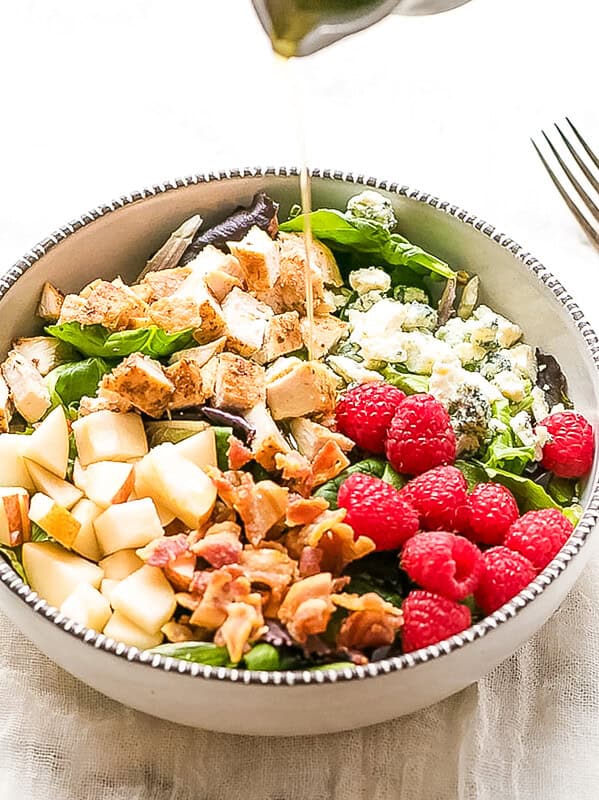 raspberry chicken pear salad in a bowl